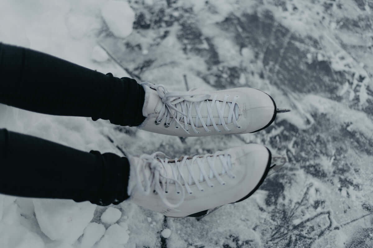 a pair of feet in white socks