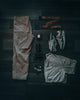 gray pants on black table
