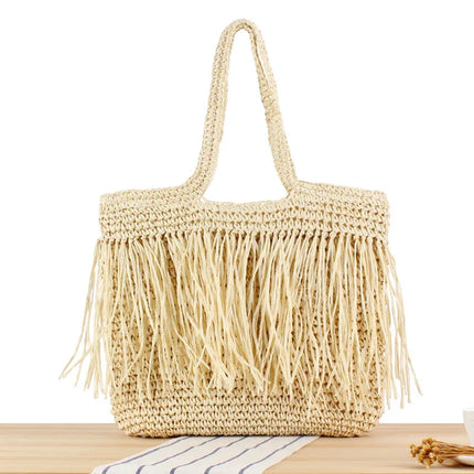 Bolso bandolera tejido a mano y con flecos