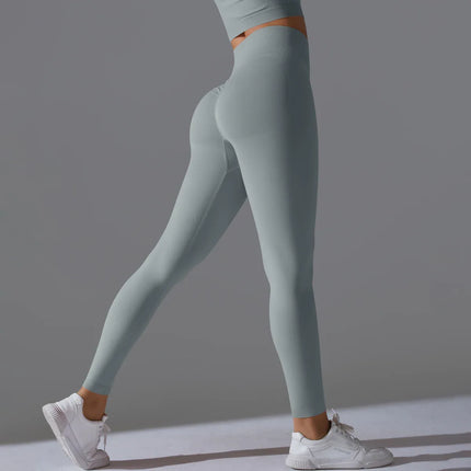Seamless Solid Peach Sports Trousers for Women - Tight Running Fitness Yoga Pants with High Waist and Butt-Lifting Design - tugranalmacen.com