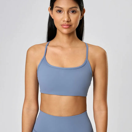 Camisola deportiva con espalda cruzada y escote redondo