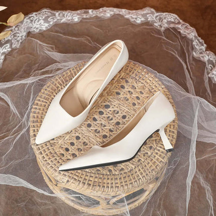 Zapatos de tacón de punta de piel sintética