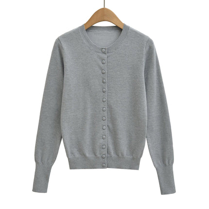 Top holgado de cuello redondo, manga larga y botonadura sencilla - tugranalmacen.com
