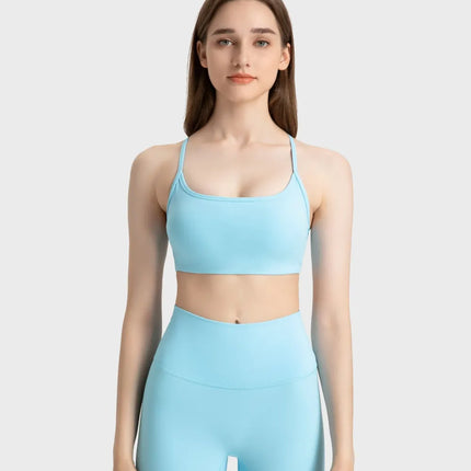 Camisola deportiva con espalda cruzada y escote redondo