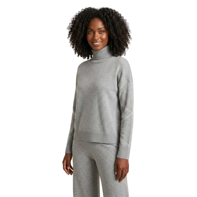 Conjunto de suéter y pantalón en negro