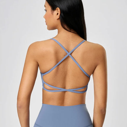 Camisola deportiva con espalda cruzada y escote redondo