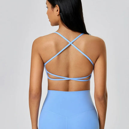 Camisola deportiva con espalda cruzada y escote redondo