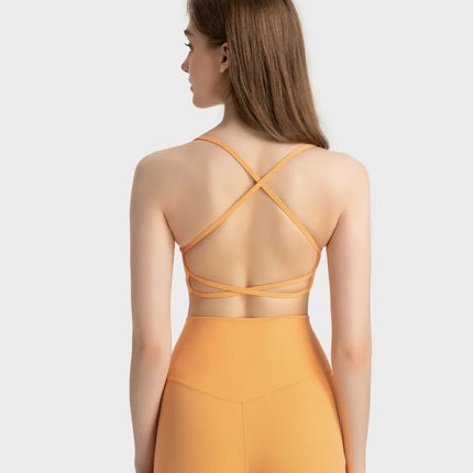 Camisola deportiva con espalda cruzada y escote redondo