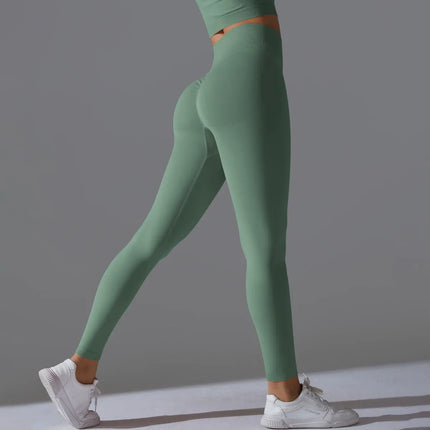 Seamless Solid Peach Sports Trousers for Women - Tight Running Fitness Yoga Pants with High Waist and Butt-Lifting Design - tugranalmacen.com