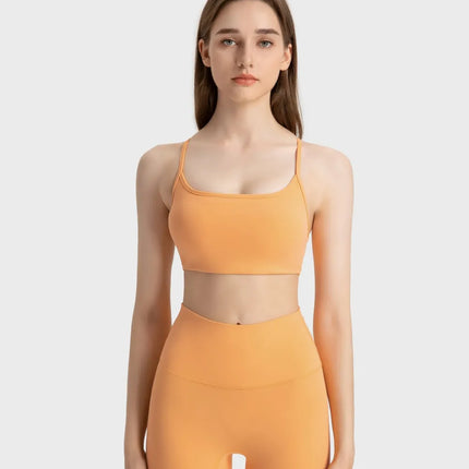 Camisola deportiva con espalda cruzada y escote redondo