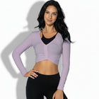 Top deportivo de manga larga para mujer - vista frontal