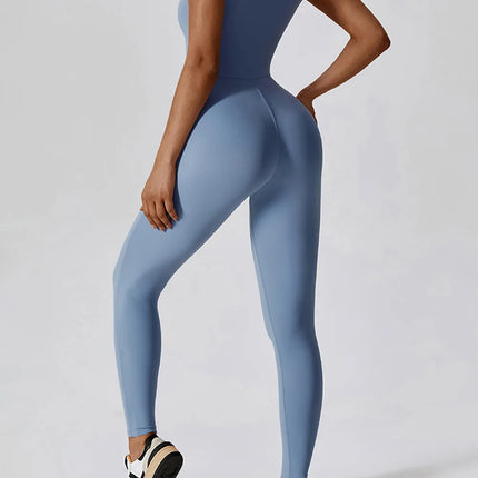 Mono elástico deportivo amarillo con cremallera para mujer