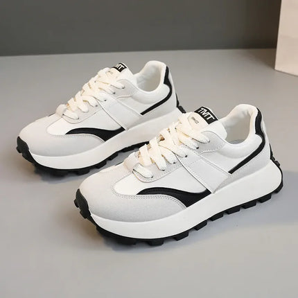 Zapatillas Urban TMT blancas y negras de tela estilo casual deportivas