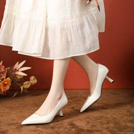 Zapatos de tacón de punta de piel sintética