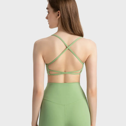 Camisola deportiva con espalda cruzada y escote redondo
