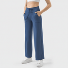 Pantalones deportivos con cordón y bolsillos
