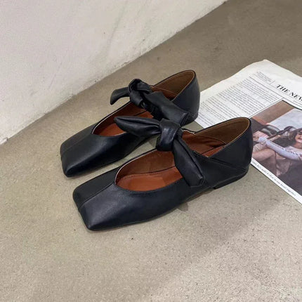 Zapatos Mary Jane planos estilo francés negros de cuero con lazo