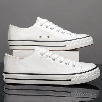 Zapatillas Stann de lona blancas con cordones y punta redonda estilo casual