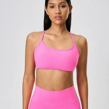 Camisola deportiva con espalda cruzada y escote redondo