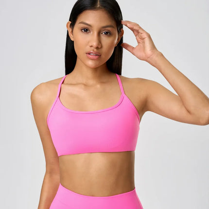 Camisola deportiva con espalda cruzada y escote redondo