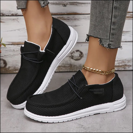 Mocasines de lona negros con punta redonda, estilo casual, suela blanca