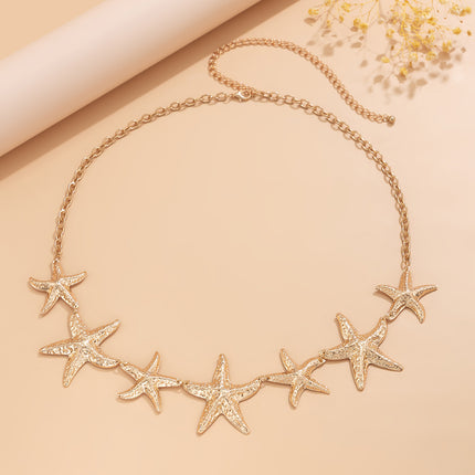 Cadena de cuerpo con estrellas de mar y perlas para playa