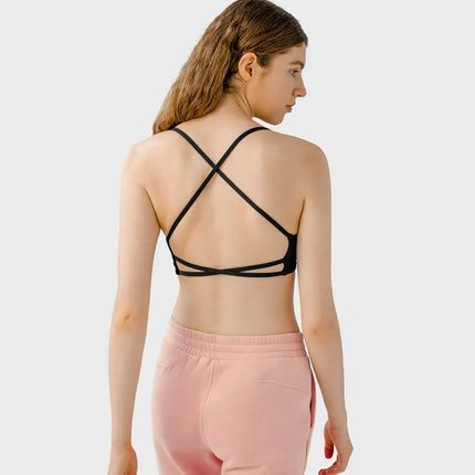 Camisola deportiva con espalda cruzada y escote redondo