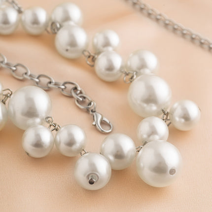 Elegante cadena de cintura ajustable con perlas y flecos