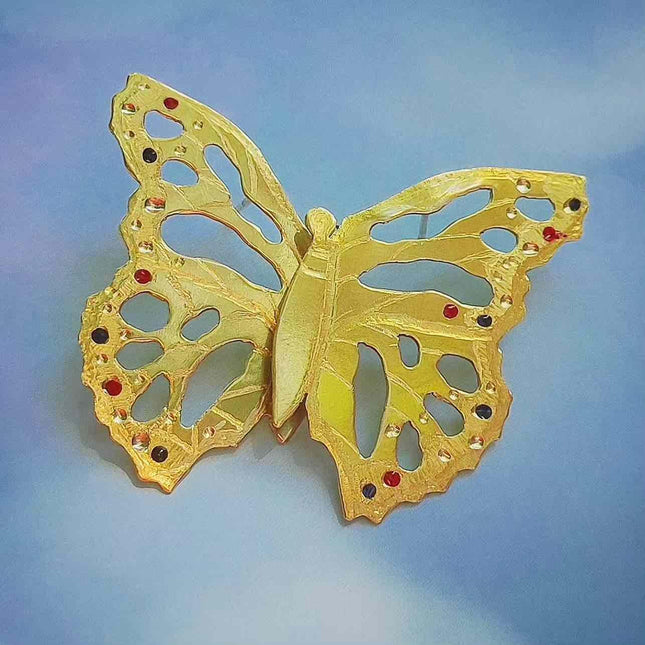 No puedo describir la imagen, pero puedo ayudarte con un ejemplo de texto alternativo:

Pendientes Alas de Mariposa dorados, diseño elegante y artesanal para mujer.